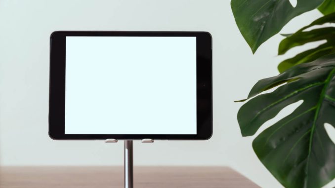 Smidigt använda dig av ett iPad ställ illustration